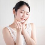 親知らずが痛い女性