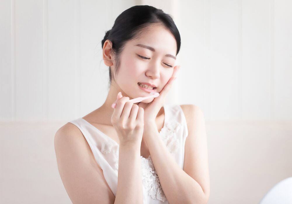 親知らずが痛い女性
