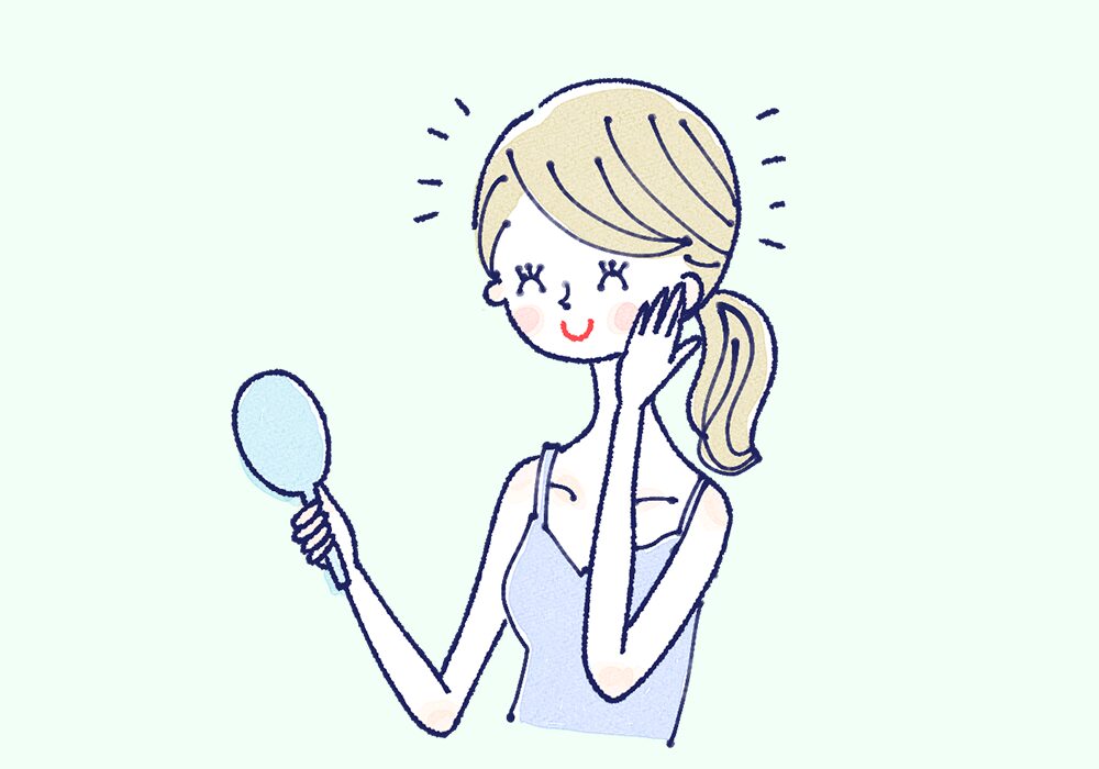 鏡を見る女性